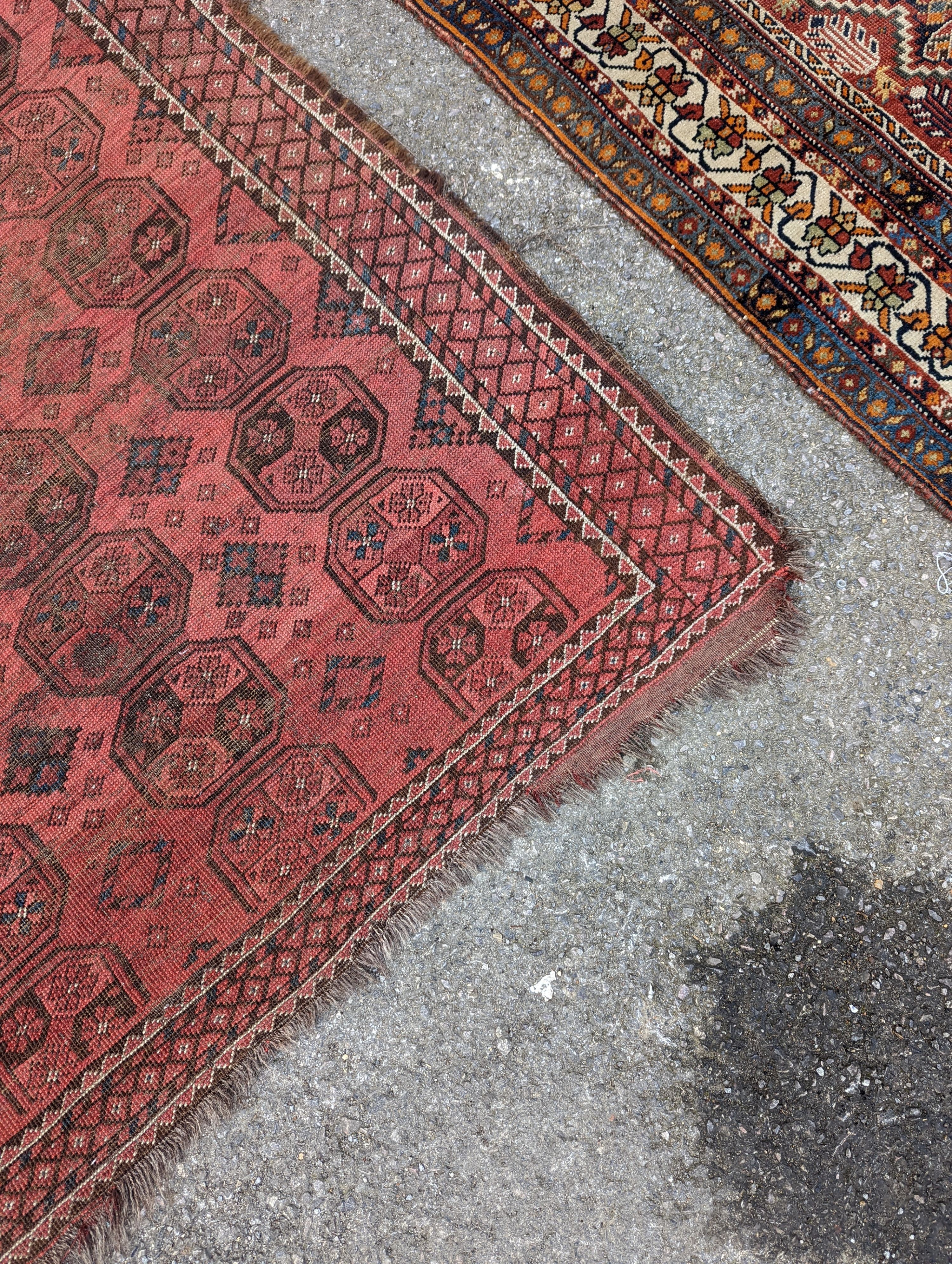 A North West Persian blue ground runner, 300 x 109 (worn and holed) a North West Persian rug, Bohara rug and mat